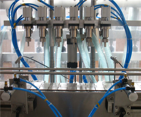 Kuue peaga automaatne vedeliku täitmise masin